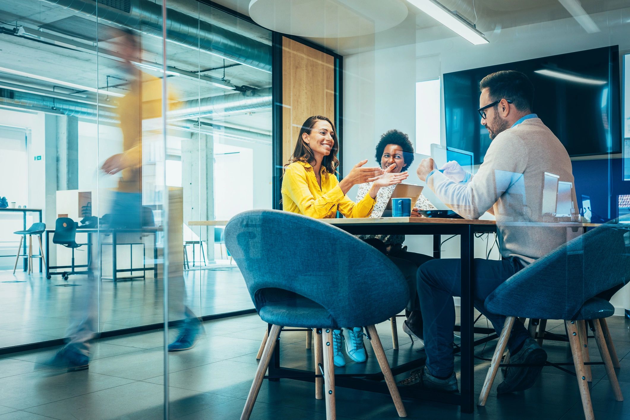 Business team in conference room discussing technology strategy
